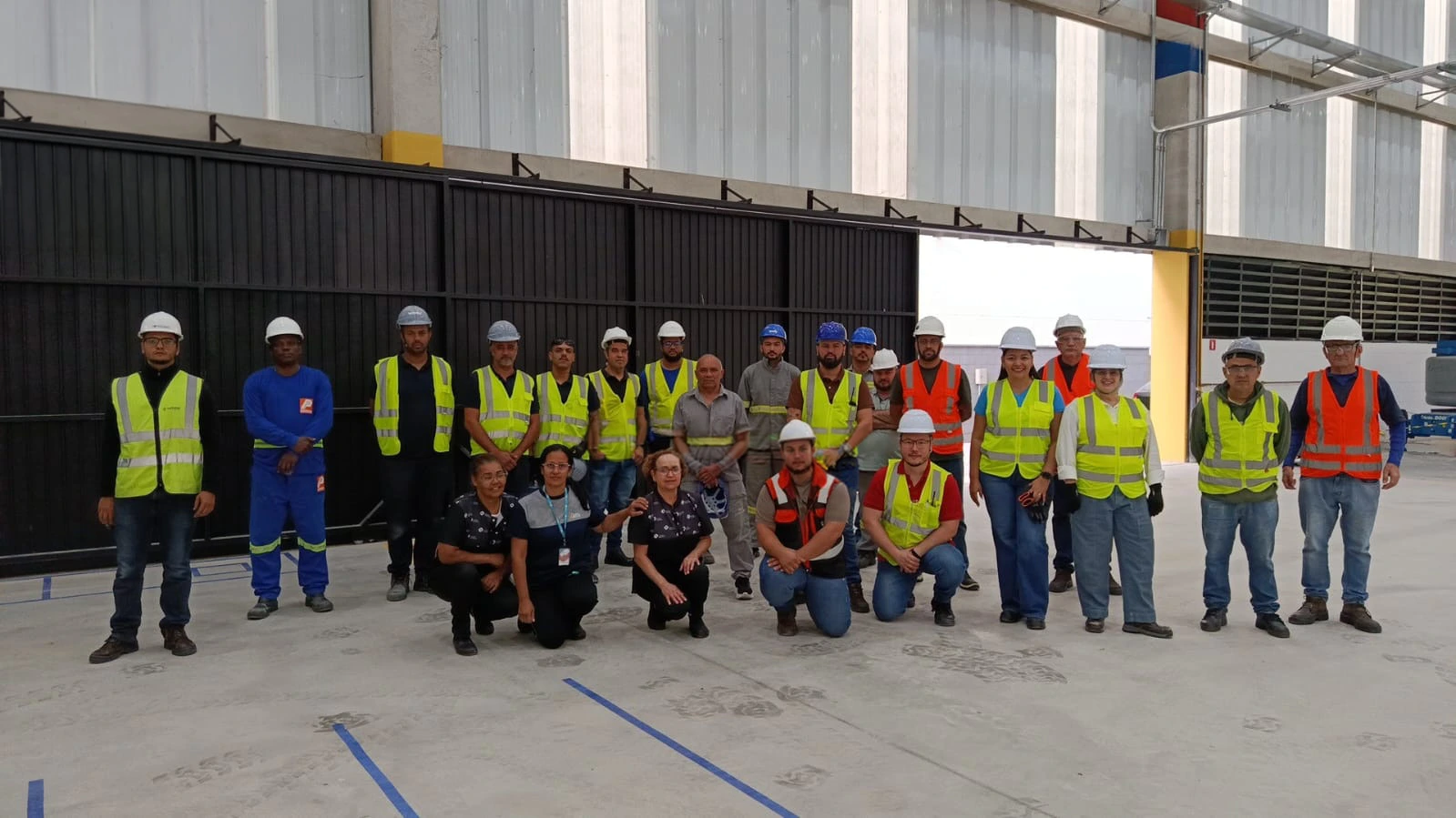 The MOCA team in São José dos Campos, Brazil, on site in hard hats and vests